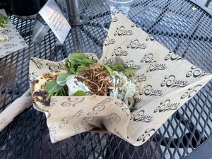 Wind blew the paper to cover the full glory of this delicious falafel wrap but get it anyway. The best falafel sandwich anywhere    at Dune in Los Angeles