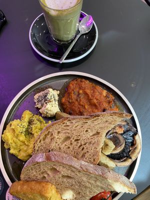 Matcha latte and vegan plant dish at 17 Grams in Brighton