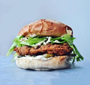 Classic chickhun burger with a crispy chickhun fillet, cheese, pickles, lettuce and homemade mayo at Huns in Leicester