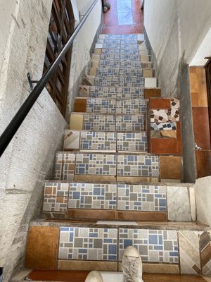 Steps up to the cafe at Salud Para Vida in San Pedro La Laguna