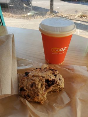 Vegan blackberry scone. Coffee with soy creamer. at The Wedge Community Food Co-op in Minneapolis