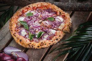 Tasty and easily digestible pizza, thanks to a dough that has been leavened and matured for over 72 hours. at Pizza Massilia in Bangkok