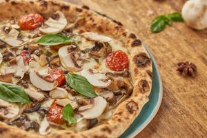 We introduce a new concept of Italian gourmet pizza, making sure it is always contemporary.
"Pizza Funghi Misti" at Pizza Massilia in Bangkok