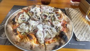 This is a large vegetarian, switched to vegan cheese. It was about 12€. The ingredients and base were delicious!   at Porto Rino in Crete