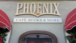 Eingangsschild  at Phoenix Book Café in Klagenfurt