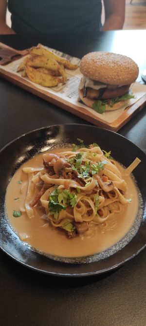 Pad Thai. Burger with 'no chicken' in the background. at Street & Soul in Toledo