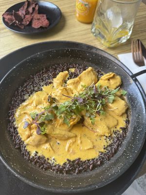 Chicken with black rice   at Street & Soul in Toledo