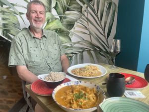 One happy muncher! The ‘Madras  meat ‘ was outstanding!    at Street & Soul in Toledo