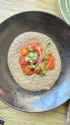 Black hummus(black chickpeas with black seed tahini)  at Street & Soul in Toledo