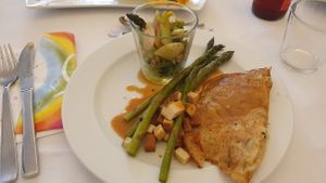 Salad with rhubarb, kimchi filled pancake with asparagus, smoked tofu and miso sauce  at Mala in Leipzig