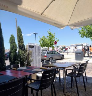 Outside seating facing the river at Dawat in Tavira