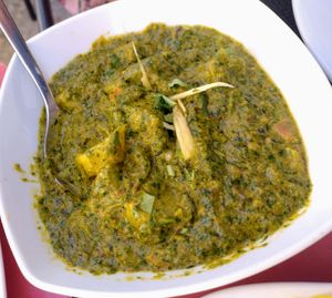 Saag aloo at Dawat in Tavira