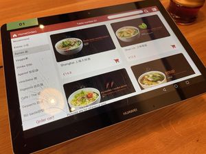 Order using devices on the tables  at Ramen 面面聚到 in Luxembourg City