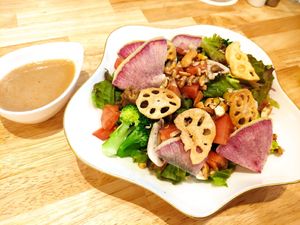 Salad with sesame dressing at KOMEDA is in Tokyo