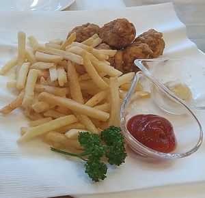karaage and fries at KOMEDA is in Tokyo