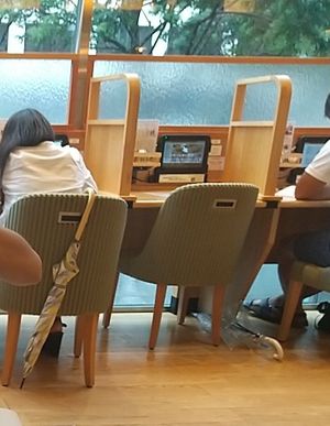 There are individual seats too at KOMEDA is in Tokyo