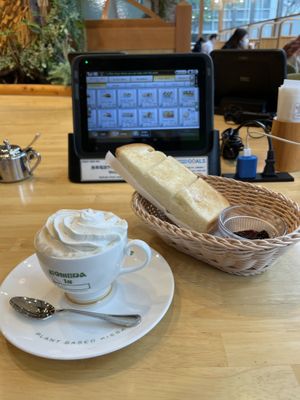 Vienna coffee with whipped cream that comes with a free toast  at KOMEDA is in Tokyo