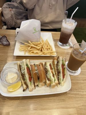 Lemon soy meat sandwich with iced oat latte. Friend had the curry burger and iced chocco  at KOMEDA is in Tokyo
