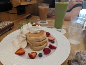 Vega pancakes with fruit and cream. at KOMEDA is in Tokyo