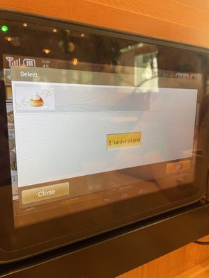 Funny menu listing in English. Not sure what I understood.  at KOMEDA is in Tokyo