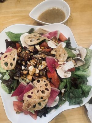 Salad with sesame dressing  at KOMEDA is in Tokyo