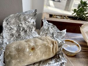 Tofu scramble, potato and bacon burrito   at Wholesome Bakery in San Francisco