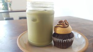Turtle cupcake and macha latte at Wholesome Bakery in San Francisco