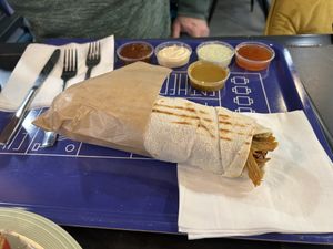 Wrap with all Sauces!! Sweet Chilli / Garlic Herb Mayo/ Sriracha Mayo/ Plum Sauce/ Sweet Mustard (Not Pictured was the also Tasty Cheese Sauce)   at Warzywina in Gdynia