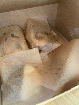 Cinnamon rolls and two tone cookies to go!! at Spatula in Greenville