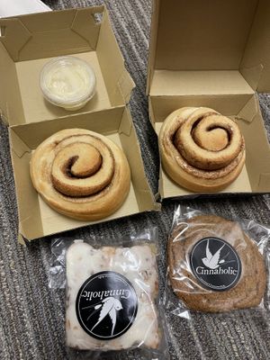 Plain cinnamon roll and other assortment of sweets  at Cinnaholic in Addison