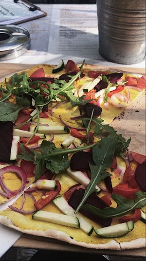 vegan tarte flambé with veggies and homemade turmeric paste  at Coffeefee Inh.Mareike knowledge in Wyk Auf Foehr