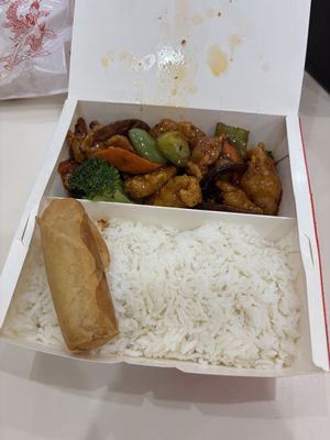 general tsos chicken with white rice and spring roll  at VeGreen 2 Go in Duluth