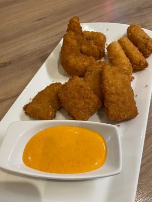 78. Steikt Vegan Combo: This is an appetizer of fried vegan squid, surimi, and shrimp served with chilli vegan  at Loving Hut in Reykjavik