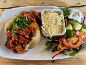 Vegan chilli and vegan cheese jacket potato   at Ness Deli in Drumnadrochit