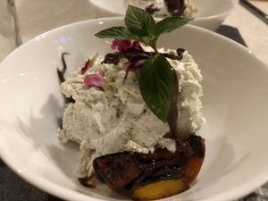 Banana ice cream with caramelised peaches   at Molino del Corregidor in San Roman De Cameros