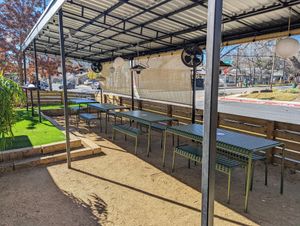 Extensive patio with a small parking lot out back. at Bento Picnic in Austin