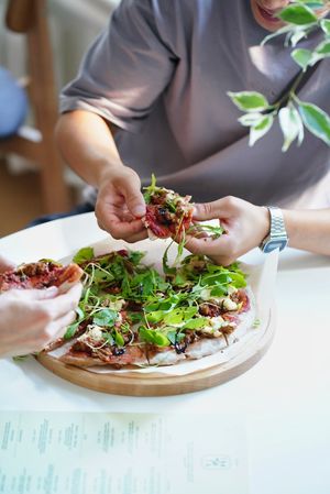 Pizza with plantbased meat, tomatos. Glutenfree dough at Tvoya Kultura in Tyumen