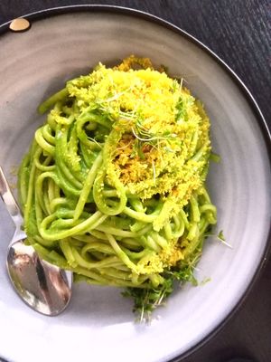 Vegan pasta with green sauce at KLYO in Vienna