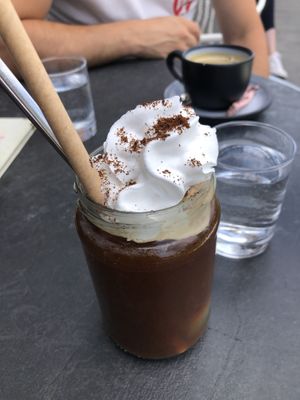 Coffee with hazelnut ice cream and vegan cream (6,50€) / coffee in background   at KLYO in Vienna
