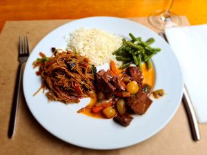 Seitan Bourguignon, noodles, green beans and rice. at GAO in Matosinhos