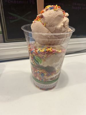 Strawberry, salted caramel, chocolate fudge brownie w/rainbow sprinkles (large)  at Sweet Izzy in Harwich Port