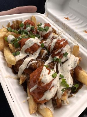 Butter chicken poutine   at Veg Out in Surrey