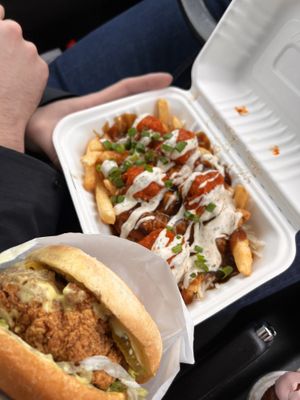 Buffalo chicken poutine and crispy chicken burger  at Veg Out in Surrey