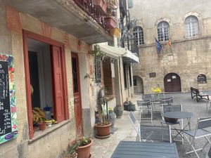 Outdoor seating area  at Le Vegetarien in Villefranche-de-conflent