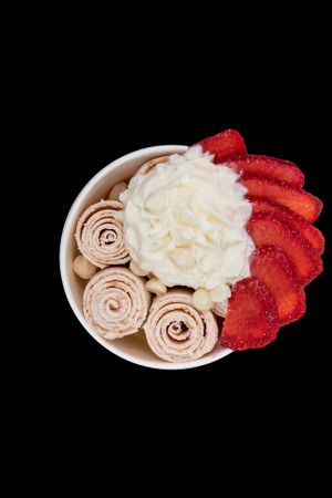 Vegan Madagascar vanilla ice cream with fresh strawberries and vegan whipped cream  at Where's The Scoop? in Alpharetta