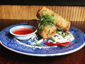 Egg rolls: shredded cabbage, carrots, tree ear mushrooms, scallions, and cilantro and is served with house-made ginger duck sauce at Kings Co Imperial in Brooklyn