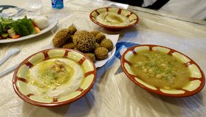 Falafel, Falafel filled with red onions, Babaganoush and Hummuss  at Hashem in Amman
