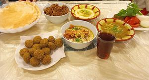 Falafel, houmous, foul, fatteh with oil (and fetteh with meat) at Hashem in Amman