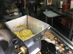 Falafel machine at Hashem in Amman