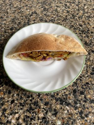 Half the shawarma pita at Eat Nabati in Toronto
